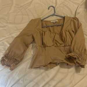 Ruched ruffle peplum nude skin tone beige workwear blouse dressy